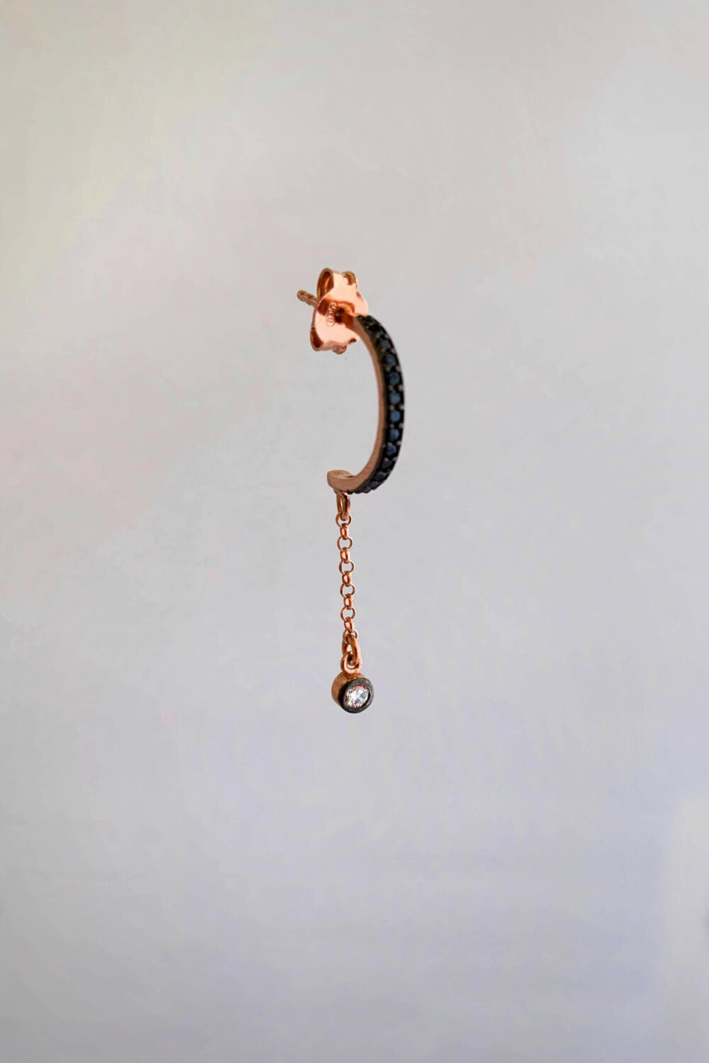 Earrings by Dora Syrrou