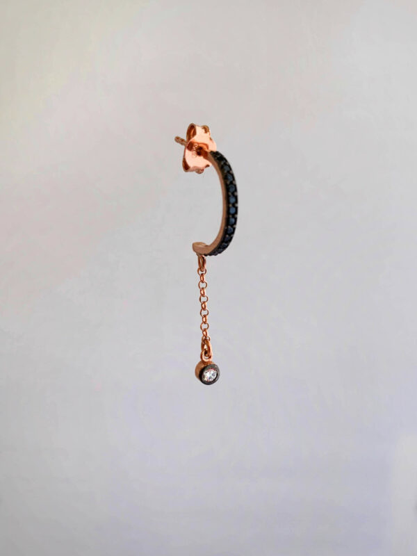 Earrings by Dora Syrrou