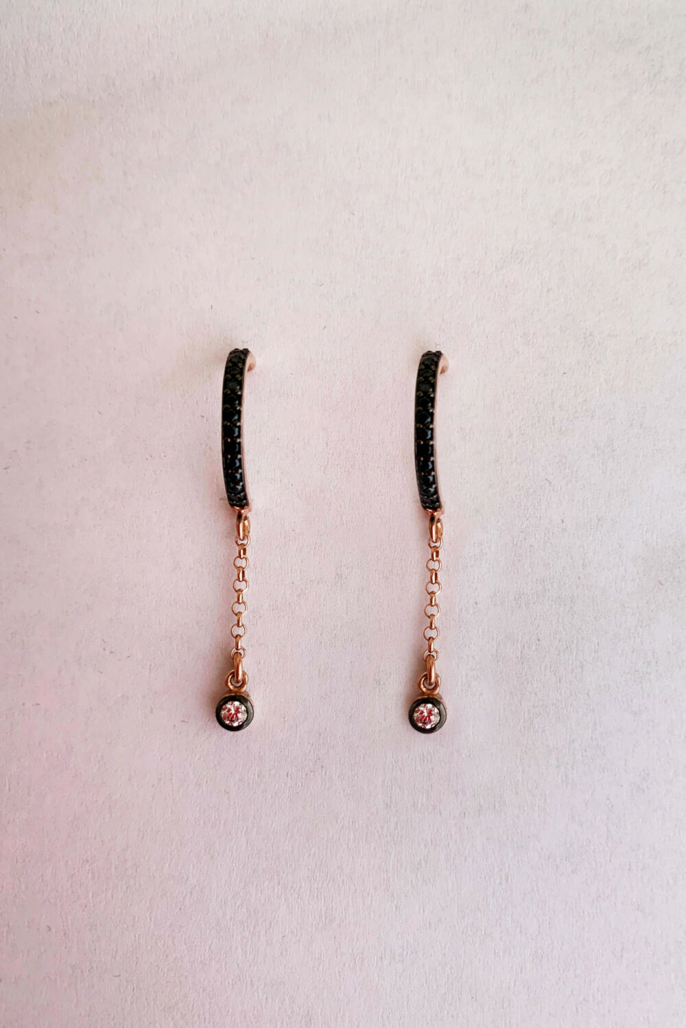 Earrings by Dora Syrrou