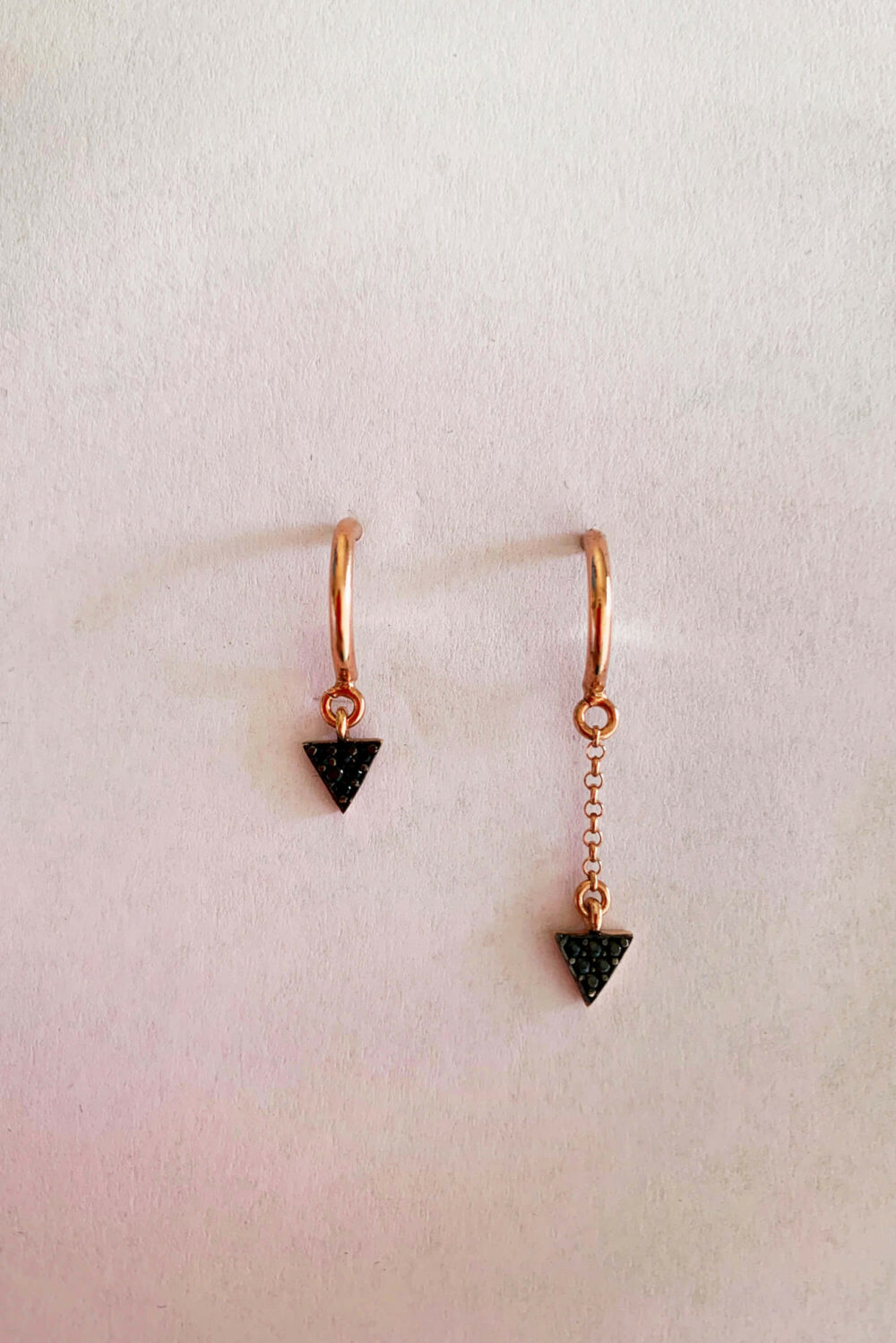Earrings by Dora Syrrou