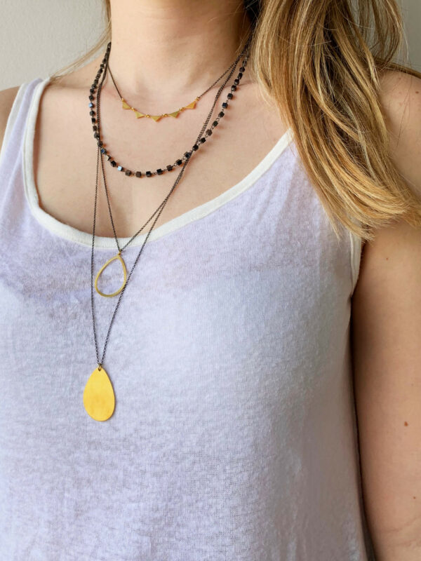 Necklace by Dora Syrrou