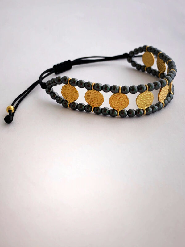 Bracelet by Dora Syrrou