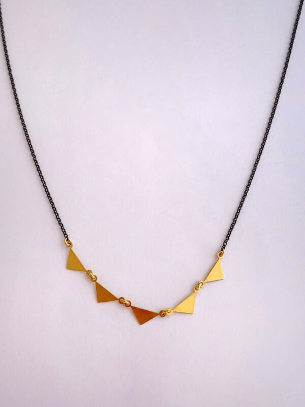 Necklace by Dora Syrrou