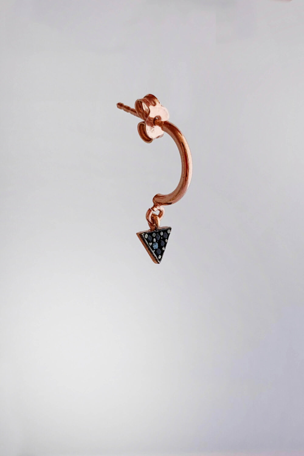 Earrings by Dora Syrrou