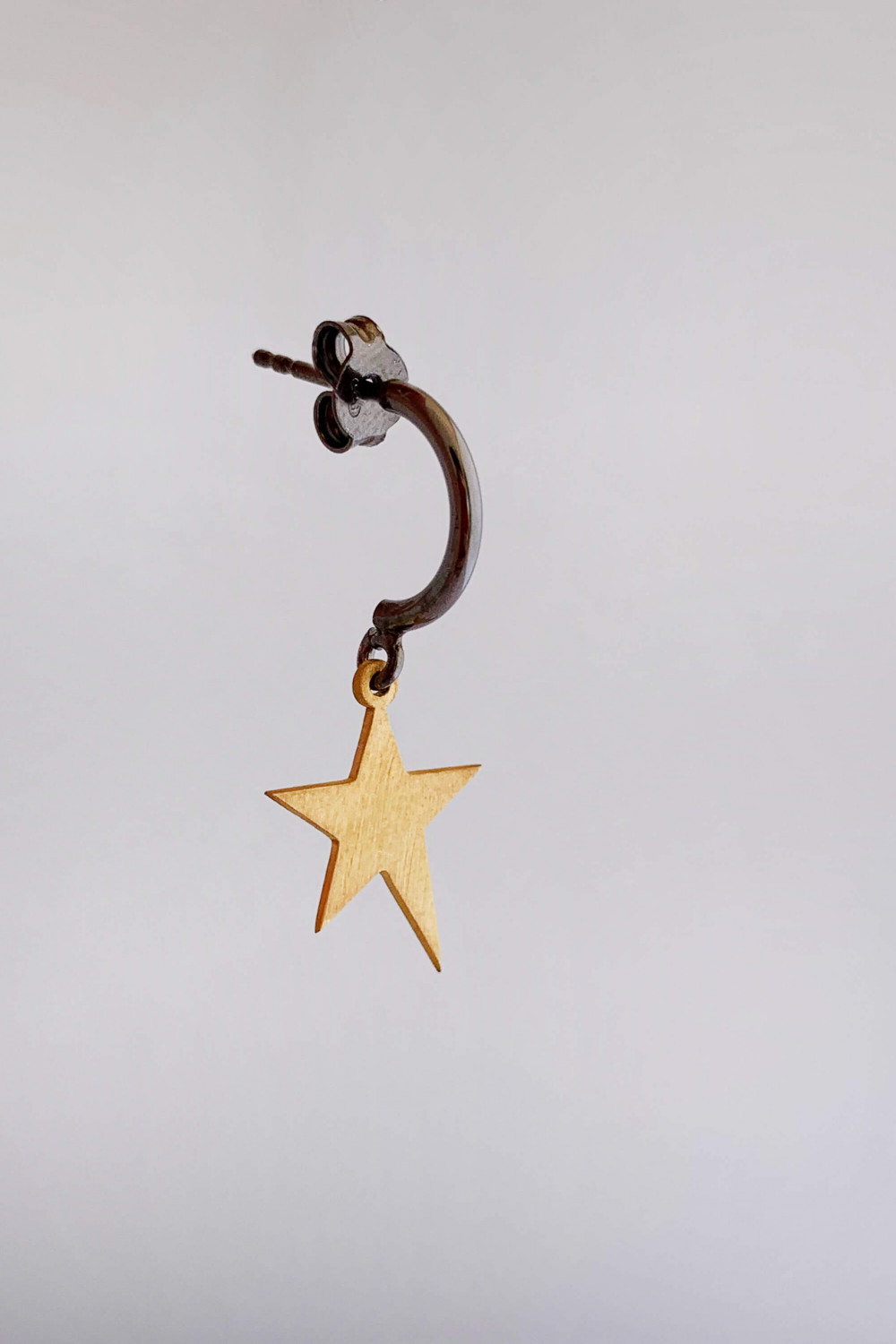 Earrings by Dora Syrrou
