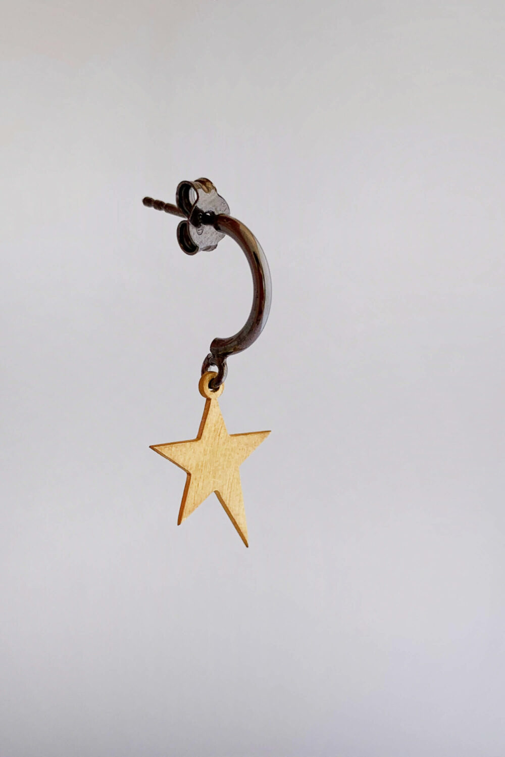 Earrings by Dora Syrrou
