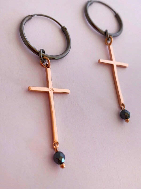 Earrings by Dora Syrrou