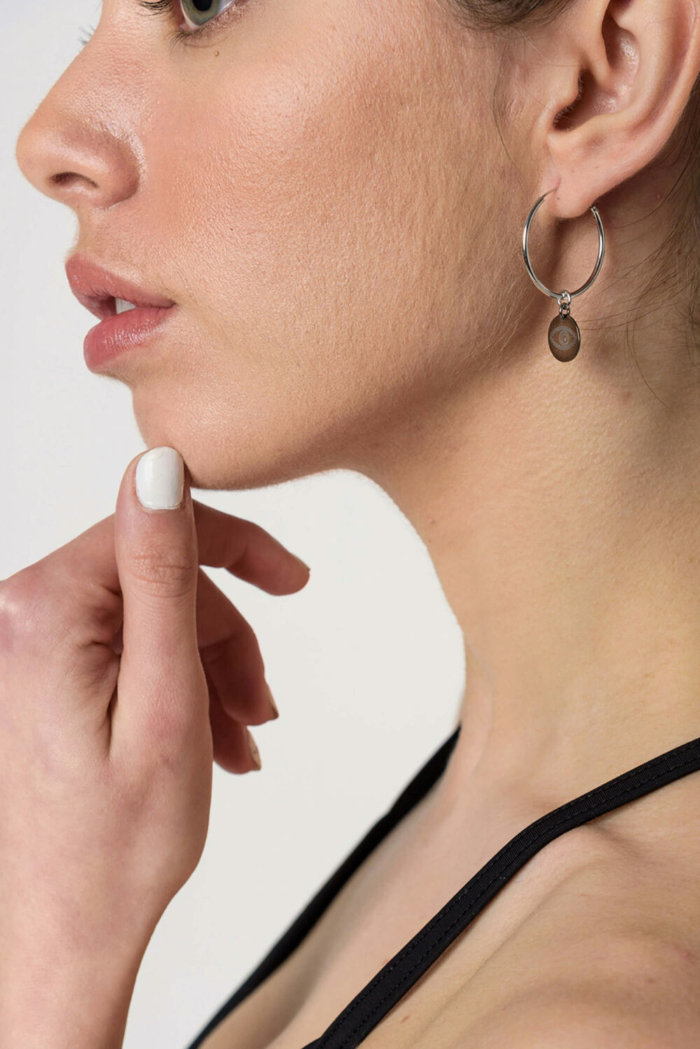 Earrings by Dora Syrrou
