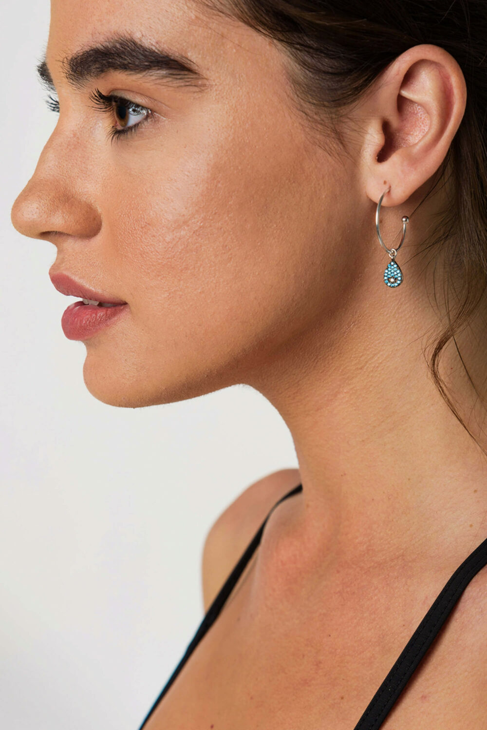 Earrings by Dora Syrrou